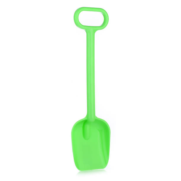istock Children's large shovel isolated on a white background. Colored plastic shovels for snow removal. Children's Sandbox Toys 1464331754