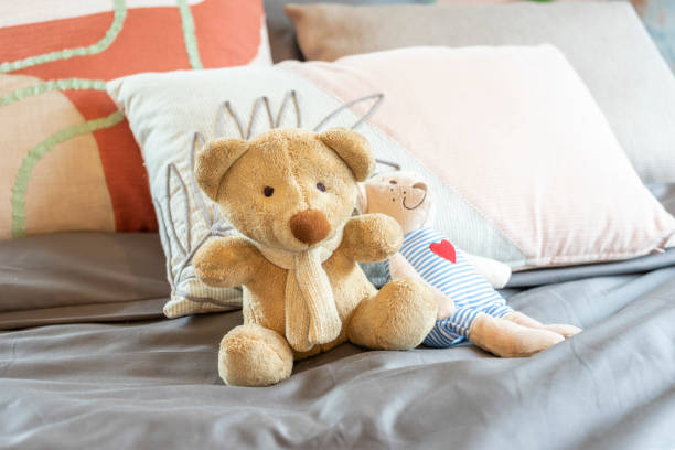 istock Lovely teddy bear on kid bedroom. 1464333163