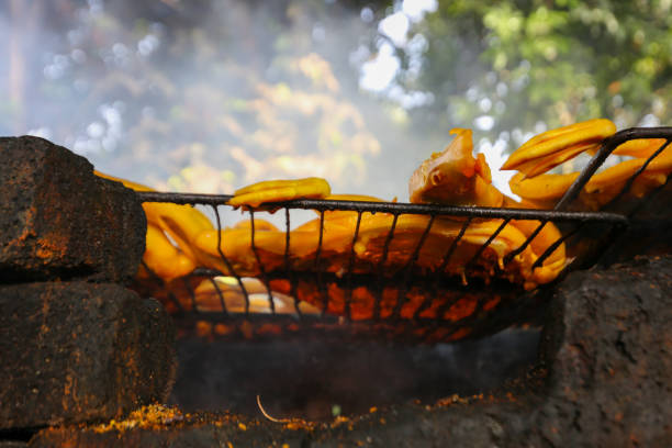 Smoked duck preparation at local stall