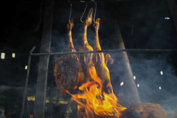 Smoked duck preparation at local stall
