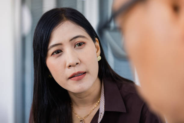 istock Asian business team brainstorming. 1464335792