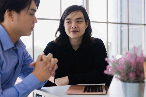 istock Asian man discussing with each other in office. 1464335921