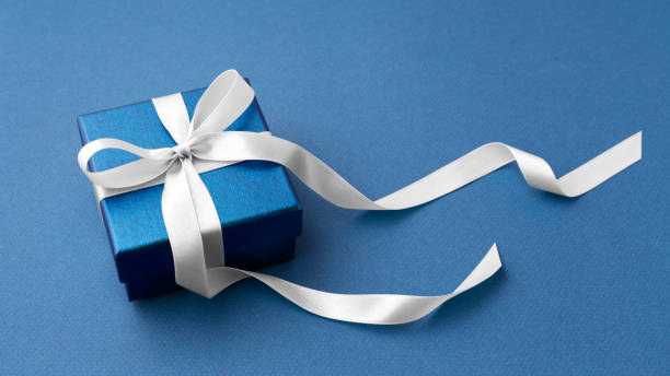 istock Blue gift box with white bow ribbon, mockup 1464338866