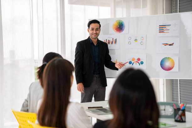 istock Business people proficiently discuss work project while sitting in circle . Corporate business team collaboration concept . 1464344716