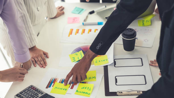 istock Business people proficiently discuss work project on meeting table . Corporate business team collaboration concept . 1464351530