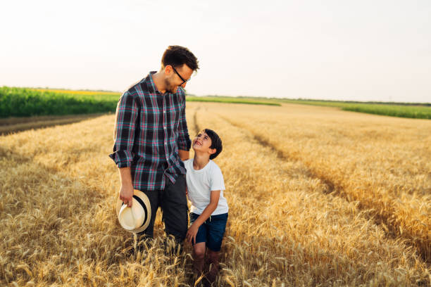 istock father and son outdoor in field 1464355917