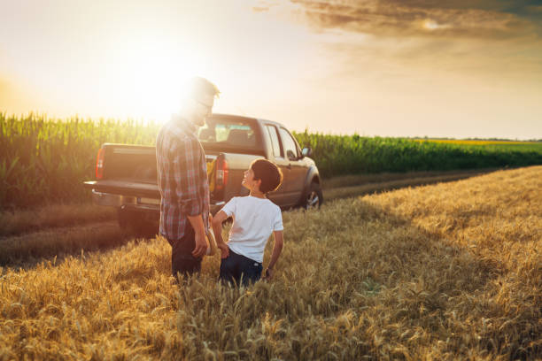 istock father and son outdoor in field 1464355919