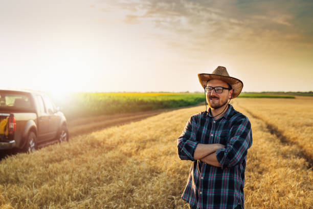 istock farmer standiong outdoor in field 1464355925