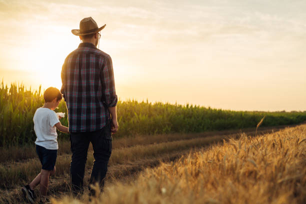 istock father and son outdoor in field 1464355926