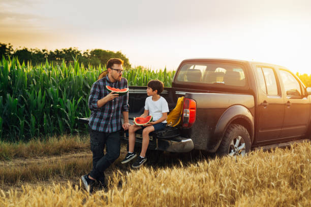 istock father and son outdoor in field 1464355944