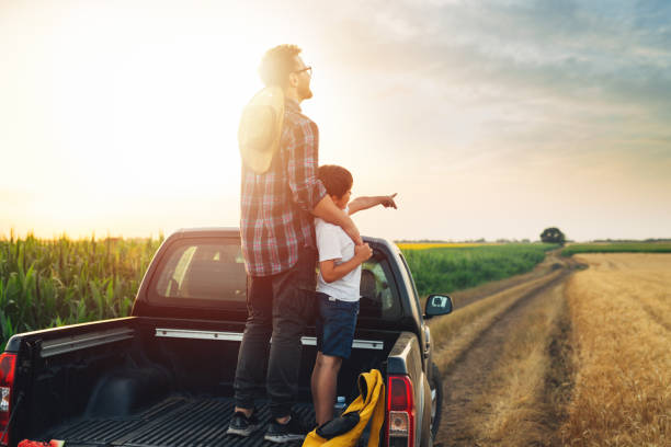 istock father and son outdoor in field 1464355958