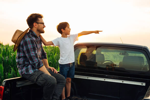 istock father and son outdoor in field 1464355963