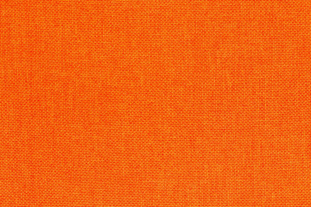 istock Orange fabric cloth texture background, seamless pattern of natural textile. 1464359299