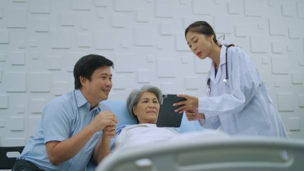 istock Female doctor checking senior female patient. 1464362084