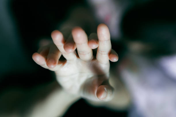 istock Women's hands in a room in daylight 1464362103