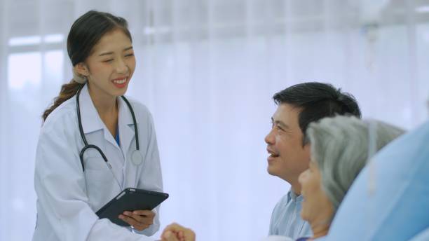 istock Female doctor checking senior female patient. 1464362130