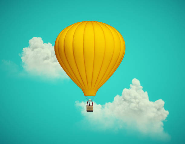 istock Hot air balloon flying above clouds. 1464364686