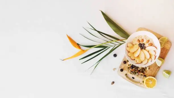 oatmeal dryfruits with bird paradise flower white background. Resolution and high quality beautiful photo