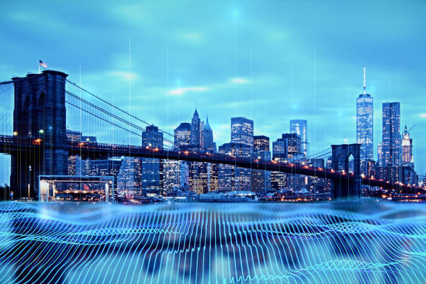 istock High speed connection, smart city and data transmission technology concept with blue digital waves imitating wires on Brooklyn bridge and New York city background, double exposure 1464384018