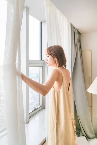 istock Asian woman take it easy at home 1464387656