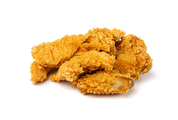 istock Chicken Strips Isolated, Breaded Nuggets, Crispy Fry Chicken Meat, American Deep Fried Crunchy Fillet Pieces 1464387825