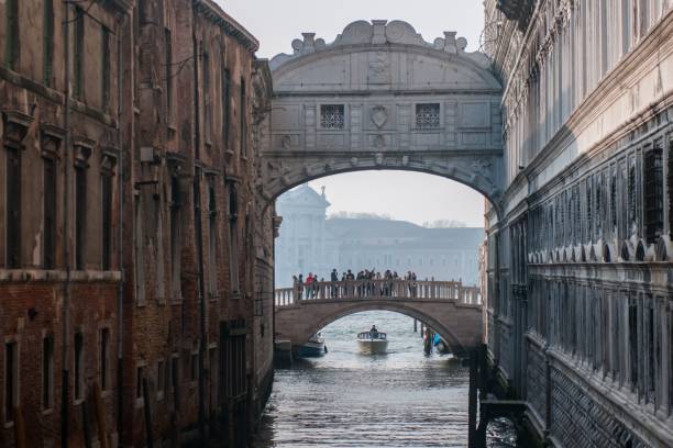 istock View of bridge over river surrounded by buildings in Venice 1464390470