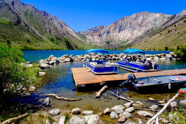 This is a photograph of boats moored on Emerald Bay in Lake Tahoe on a sunny summer day in California.