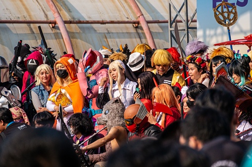 Jakarta, Indonesia – September 25, 2022: The people at a festival event, during clash cosplay in Jakarta, Indonesia gathered around the stage