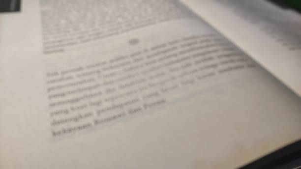 istock Defocused abstract background of a page of book 1464398189