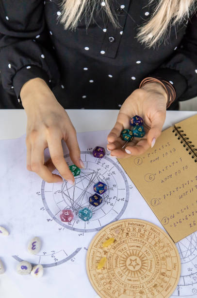 istock Woman numerologist astrologer counts numbers. Selective focus. 1464398489
