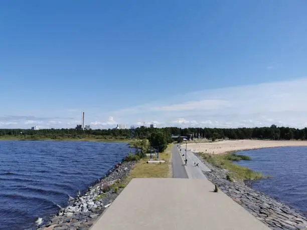 The Nalikari Beach in Oulu, Finland surrounded by the calm sea waters under the sunny blue sky