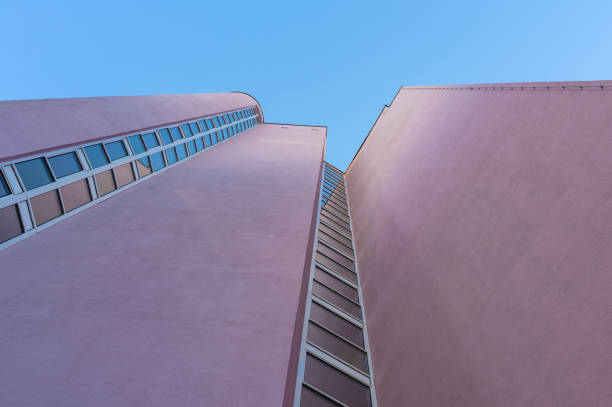 istock Low angle view of building against clear blue sky 1464403787