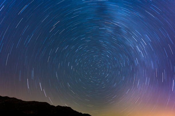 istock Meadow under a starry sky with long exposure at night - perfect for aesthetic backgroun 1464407257