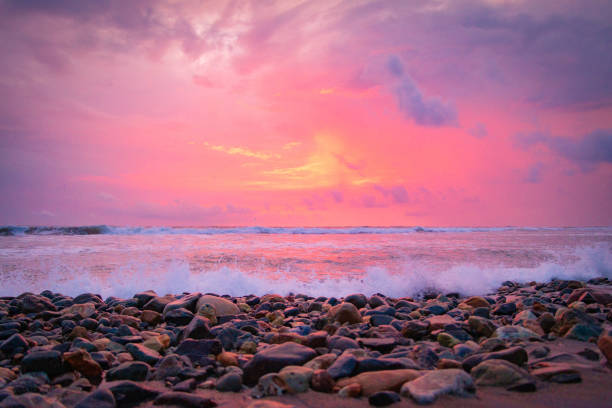 A beautiful sunset over the sea and the beach