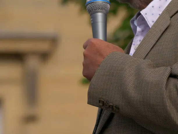 Photo of Politician making speech with microphone