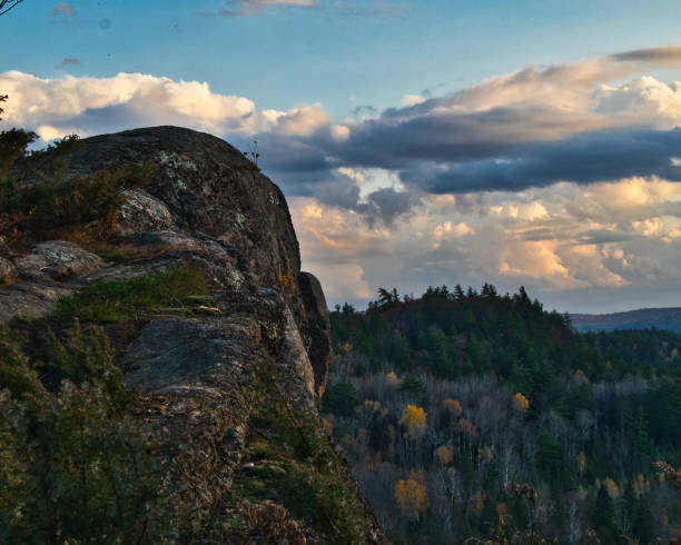 istock Cloudy sky over the mesmerizing rocks and hills in the evening 1464413503