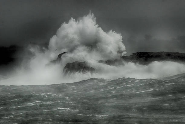 istock Waves Jumping Island and lighthouse 1464413538