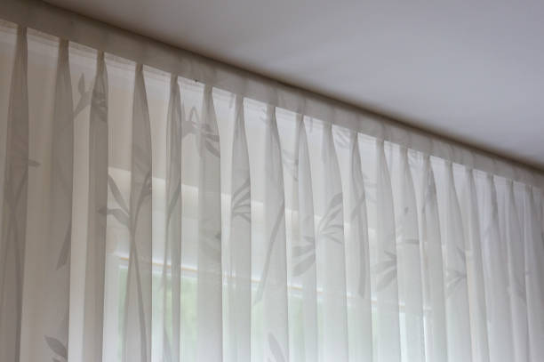 istock Closeup shot of white curtains with plant pattern 1464413774
