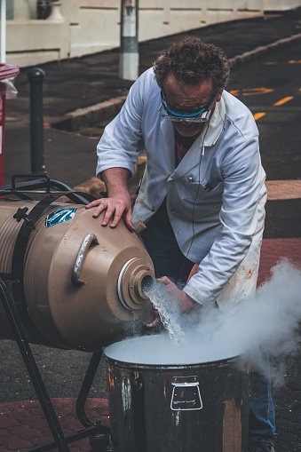 Auckland, New Zealand – September 24, 2022: A professor conducting a science experiment at Auckland University of Technology, New Zealand