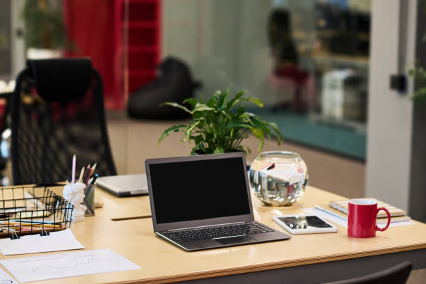 istock Laptop with black screen standing on workplace of manager 1464415054