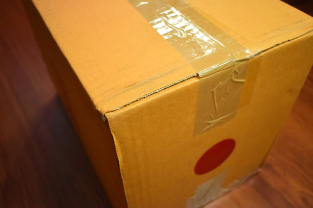 istock brown box packaging for shipping, paper texture 1464423505