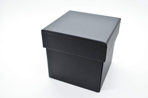 istock black paper box on white background, packaging industry 1464424100