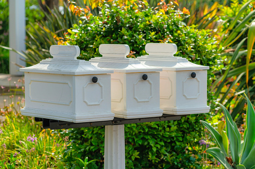 Mailing and Postage Delivery Written Communication Red Retro Postal Mailbox on Rural Road Matching 4K Video Available (Photos professionally retouched - Lightroom / Photoshop - downsampled as needed for clarity and select focus used for dramatic effect)