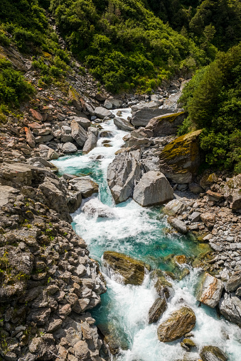 The Haast river flowing through the Gates of Haast, a deep river gorge in the Mount aspiring National Park in the South Island of New Zealand