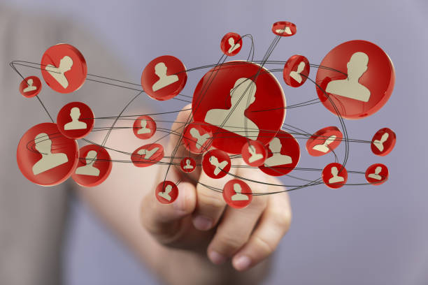 istock 3D rendering of red people silhouettes in the network team - digital network concept 1464428086