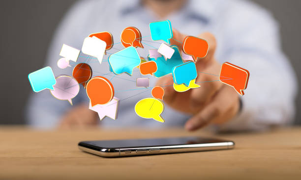 istock Person presenting the virtual projection of message bubbles 1464428263