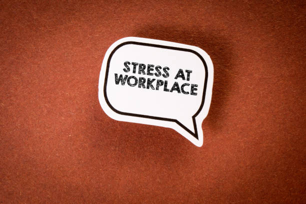 istock Stress at workplace. Speech bubble with text on brown textured background 1464430327