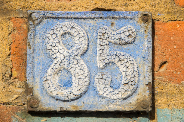 istock Old retro cast iron plate number 85 1464430764