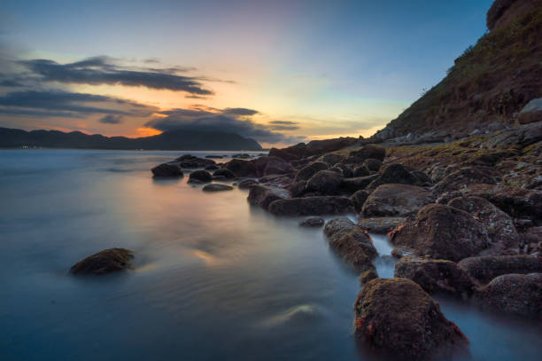 istock A Stone Tropical landscape by the beach   in the sunset 1464432572