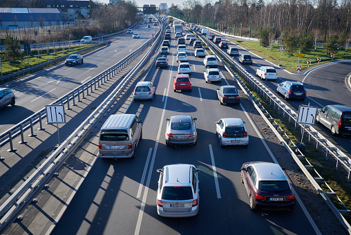 Düsseldorf, Germany - February 07, 2023: Traffic jam on the german highway no. A52 in the north of Düsseldorf. The A52 is an important connection between Düsseldorf, Mönchengladbach and the Netherlands.